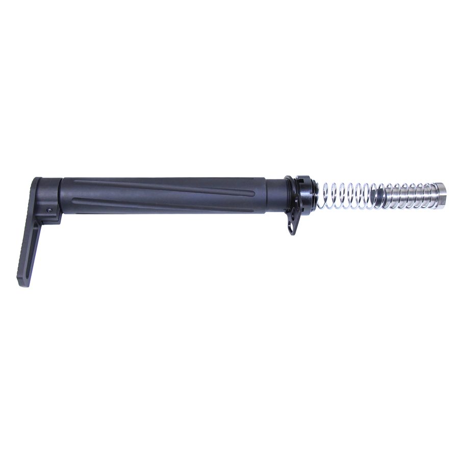 Black tactical folding stock with ribbed grip and exposed silver buffer spring for compact firearms.