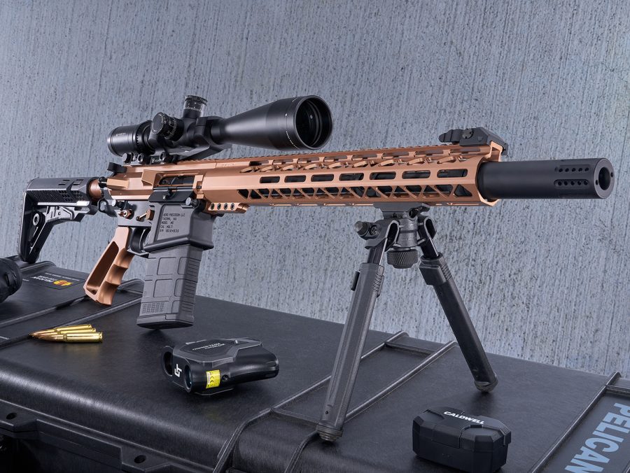 Precision two-tone rifle with scope and bipod, designed for long-range accuracy, on display.