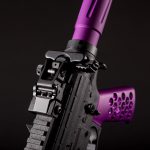 Custom AR rifle with black and purple accents showcasing premium craftsmanship and aesthetic appeal.