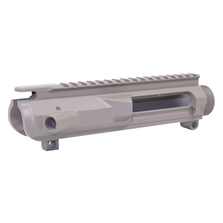 AR-15 upper receiver: raw aluminum, showing Picatinny rail, precision milling, stripped configuration.