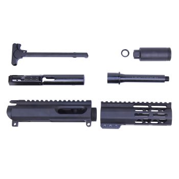 Disassembled AR-15 upper receiver parts on white background, showing matte black components.