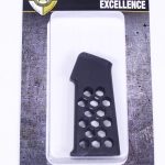 Black Tactical Excellence pistol grip with hex pattern for AR-style firearms, in retail packaging.