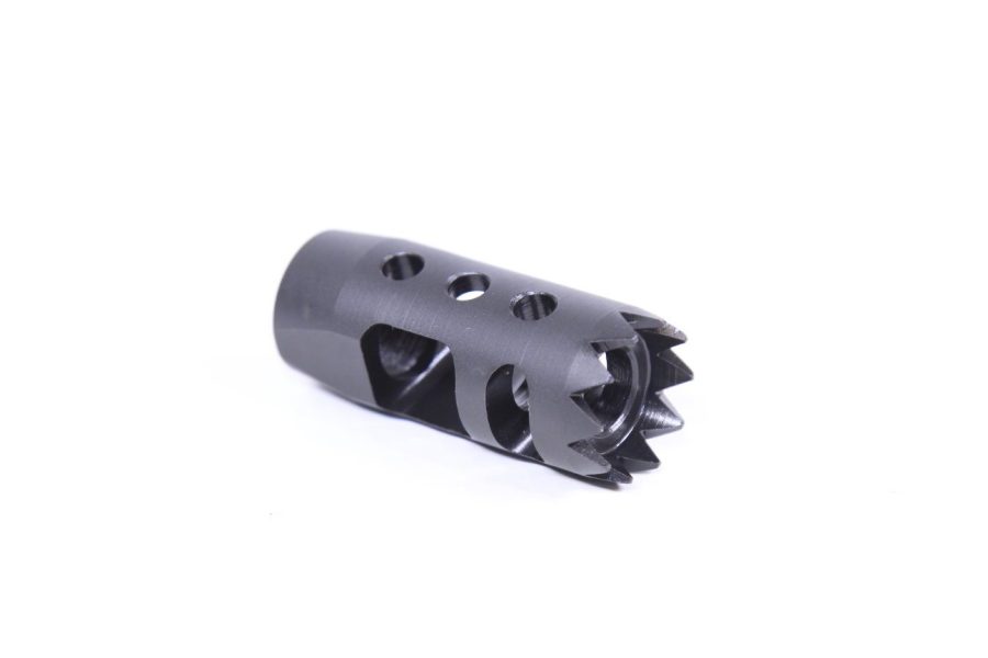 Matte black muzzle brake with serrated edges and ports for recoil control and accuracy.