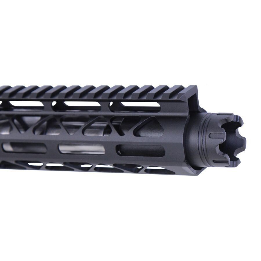 Close-up of AR-style rifle M-LOK handguard with Picatinny rail and muzzle device.
