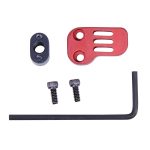 Red anodized extended magazine release for firearms with ergonomic design and precision components.