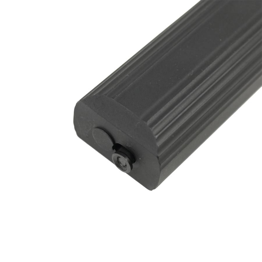 Black rubber weatherstripping with vertical ridges and metal fastener for industrial sealing.