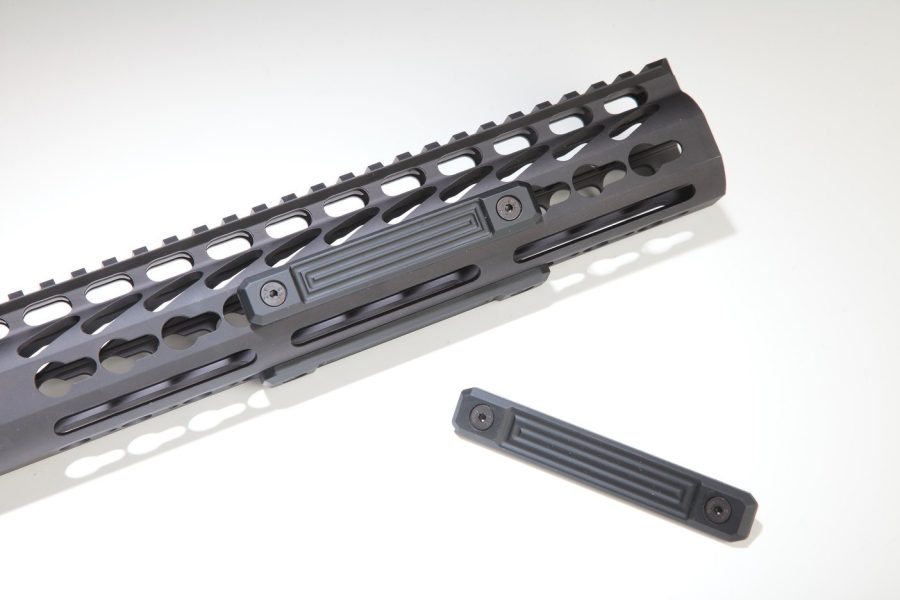 Black tactical rail handguard with keymod/M-LOK pattern for mounting firearm accessories.