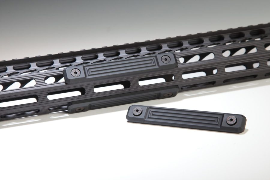 Black tactical firearm rail with M-LOK slots for accessory attachment and weight reduction.