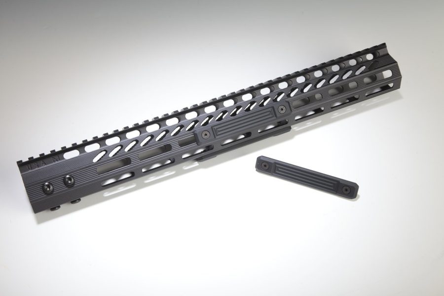 Matte black M-LOK handguard with cutouts for AR-15, including matching barrel nut.