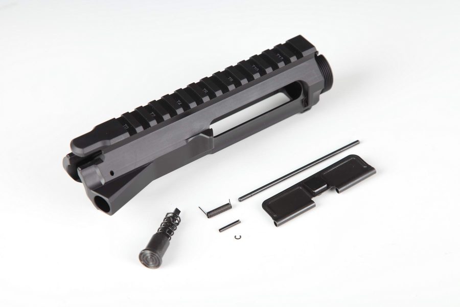 Disassembled AR-15 upper receiver kit with Picatinny rail, parts arranged on a white background.