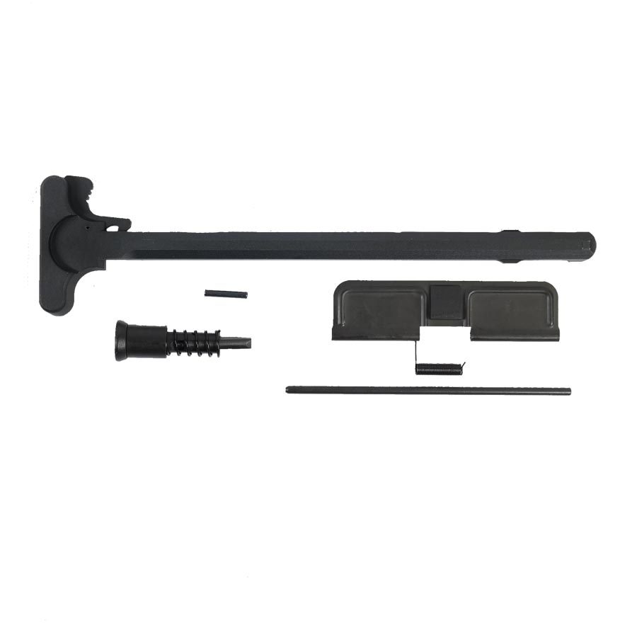 Disassembled AR-15 charging handle assembly with dust cover and spring on white background.