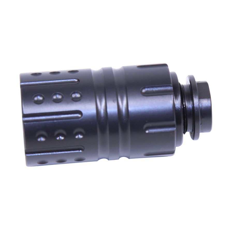 Black tactical muzzle device with perforations, grooves, and threads for reduced recoil and flash.