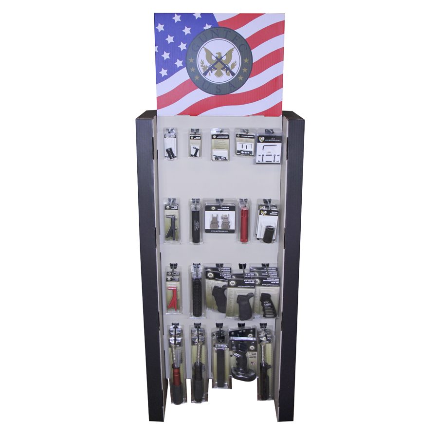 Vaping products display with American flag backdrop, organized stand for retail customer attention.
