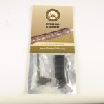Packaged tactical keyring rail attachment by Diamaco USA, visible through clear packaging.