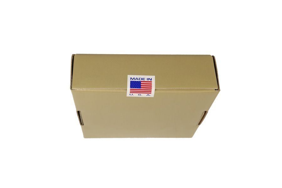 Cardboard shipping box with American flag sticker, symbolizing U.S. e-commerce and packaging.