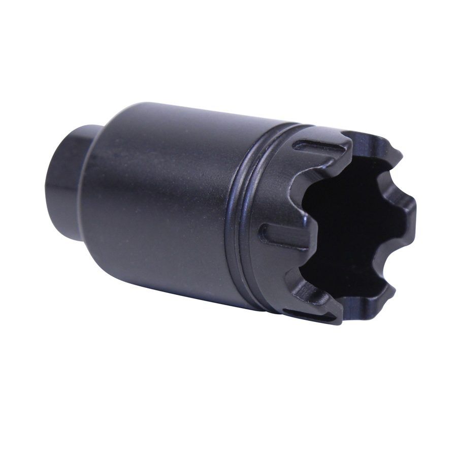 Black firearm muzzle device: notched front, internal threading, for recoil management and flash reduction.