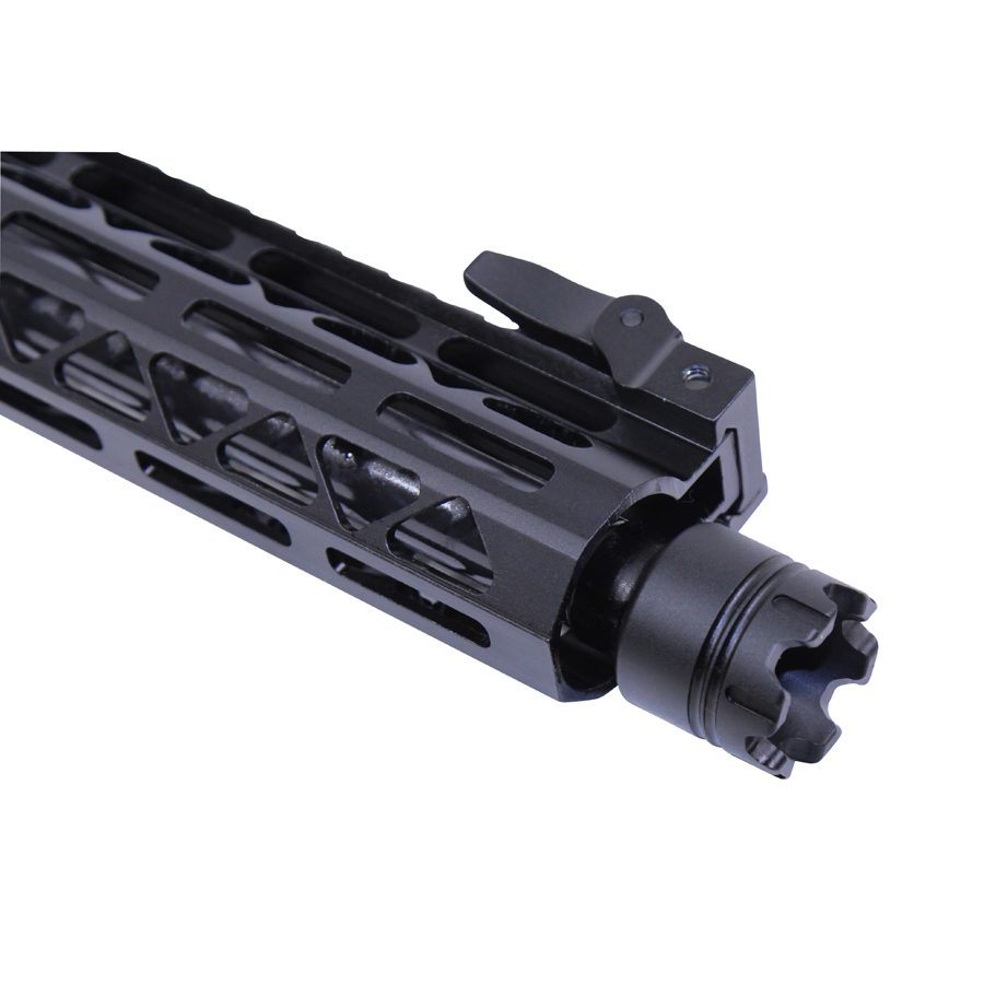 Close-up of a tactical rifle barrel with M-LOK rail and muzzle device.