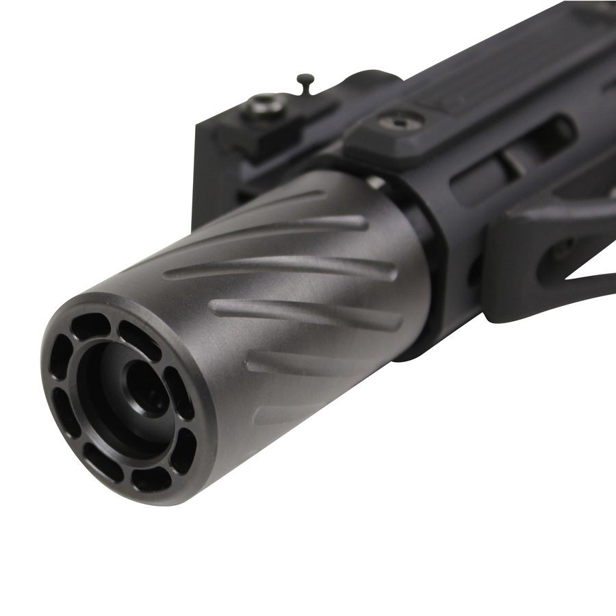 Gunmetal gray spiral muzzle brake on rifle, showcasing fluted design and tactical rail system.
