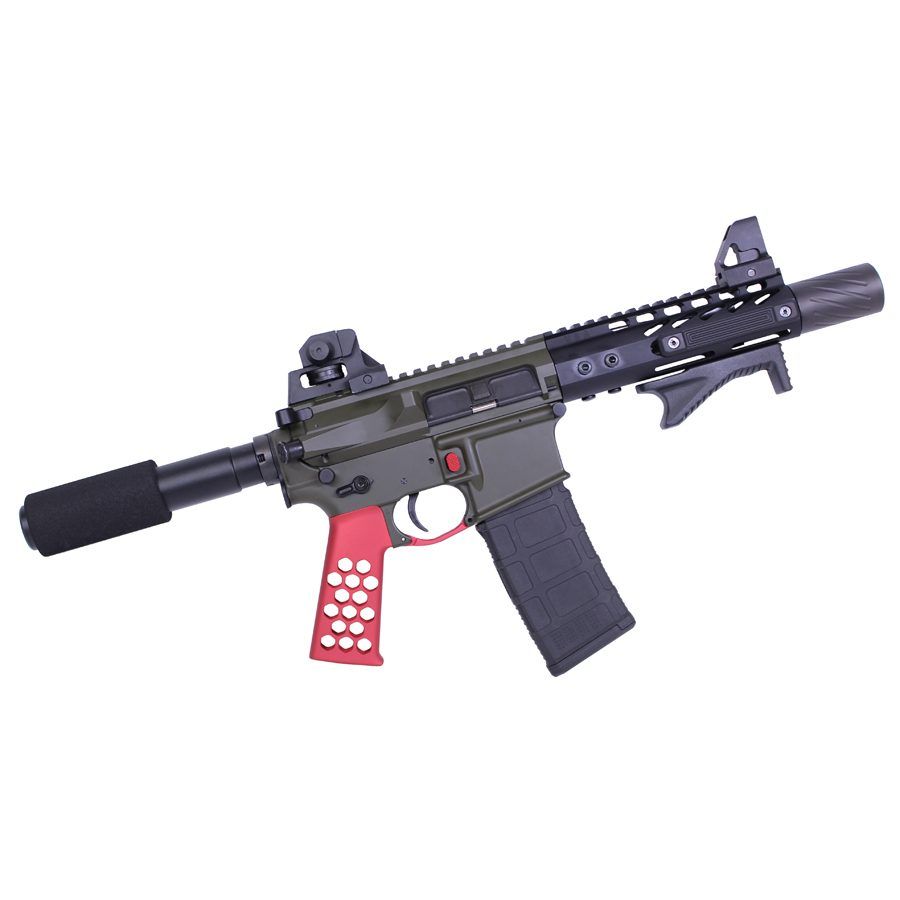Compact black airsoft gun, red grip, mock suppressor, AR-style, tactical rail for accessories.
