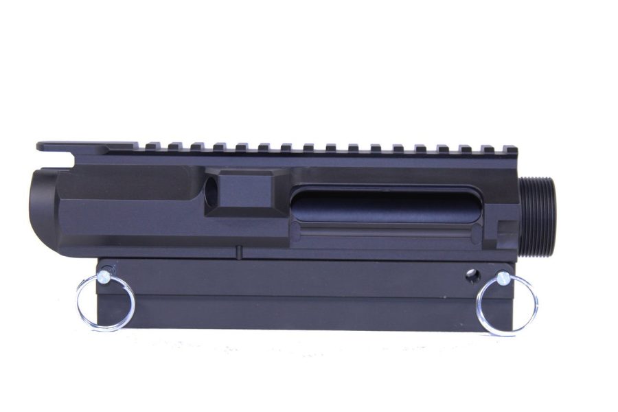 Black AR-15 upper receiver with Picatinny rail, showcasing modular design and stripped configuration.