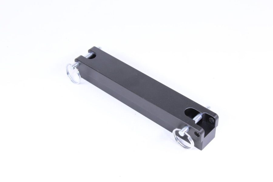 Dark anodized aluminum mount with silver screws, precision-machined for industrial systems.