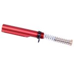 Red anodized AR-15 buffer tube with silver recoil spring and black retention ring.