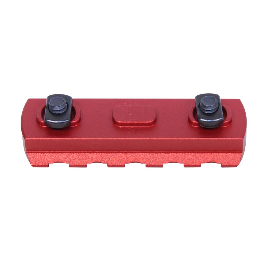 Red anodized rail mount for tactical equipment with Picatinny-style interface and black bolts.