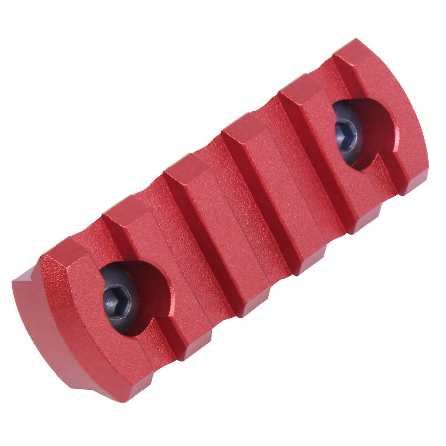 Red anodized Picatinny rail for firearm accessories, featuring slots and black screws.