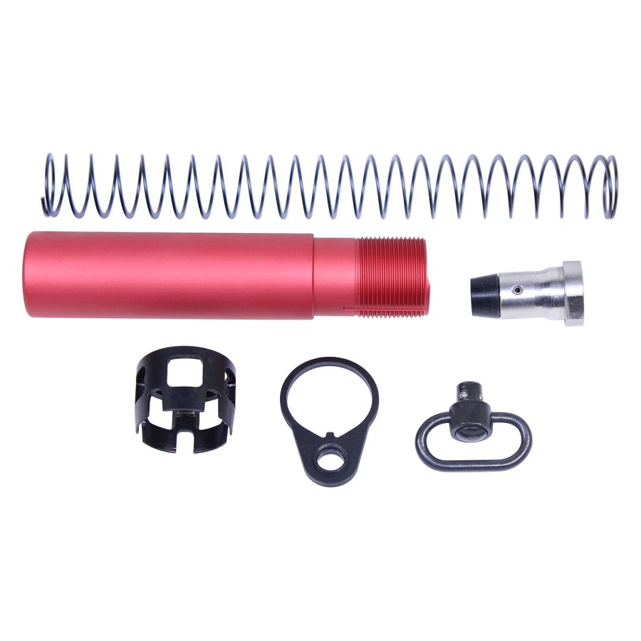 Disassembled AR-15 buffer tube kit with custom red anodized components displayed neatly.