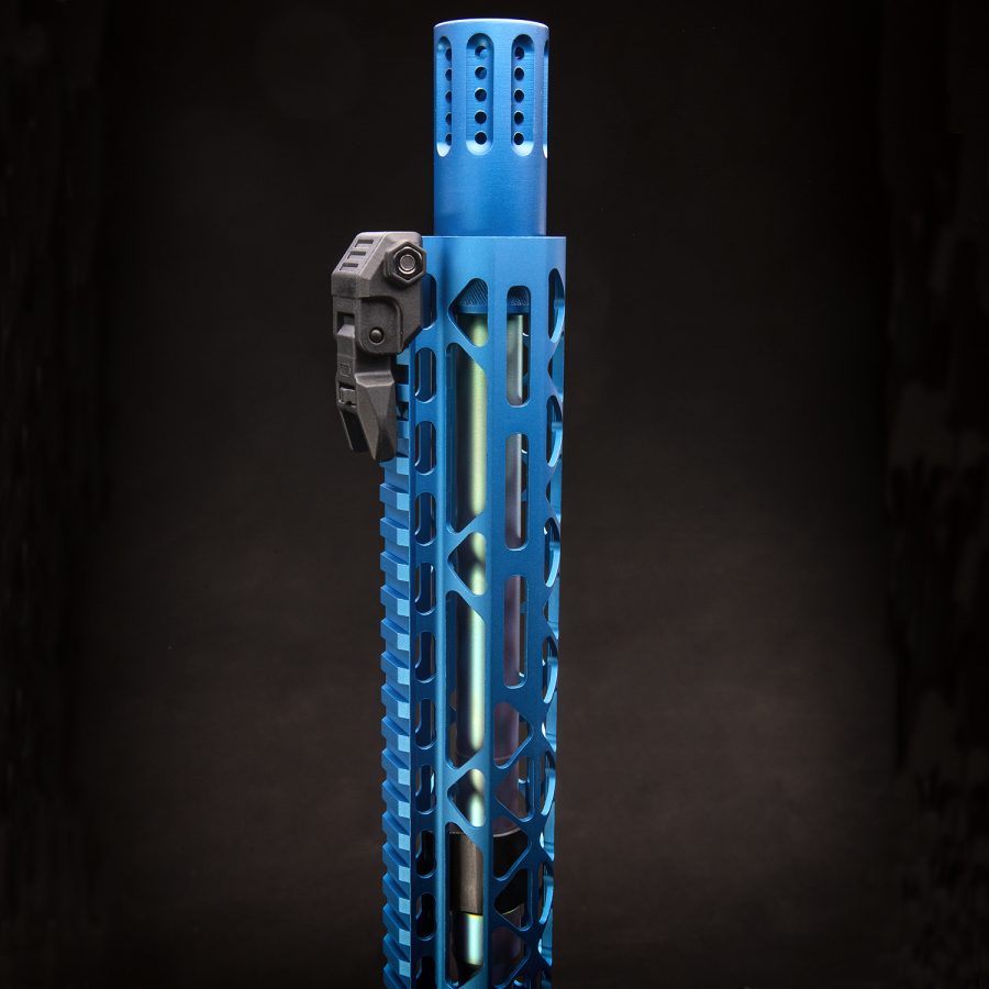 Electric blue AR handguard with M-LOK slots and Picatinny rail for versatile accessory mounting.