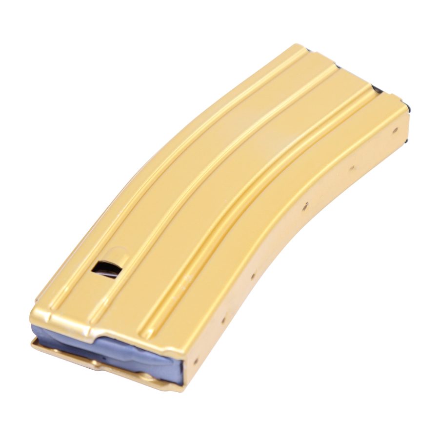 Gold-tan AR-15 rifle magazine with ribbed texture and blue follower for .223/5.56 rounds.