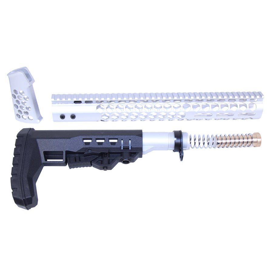 Custom AR rifle parts: black stock, gold recoil spring, gray honeycomb handguard, and grip.