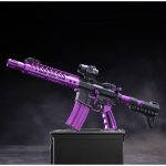 Custom purple and black AR-style rifle with metallic finish and tactical scope.