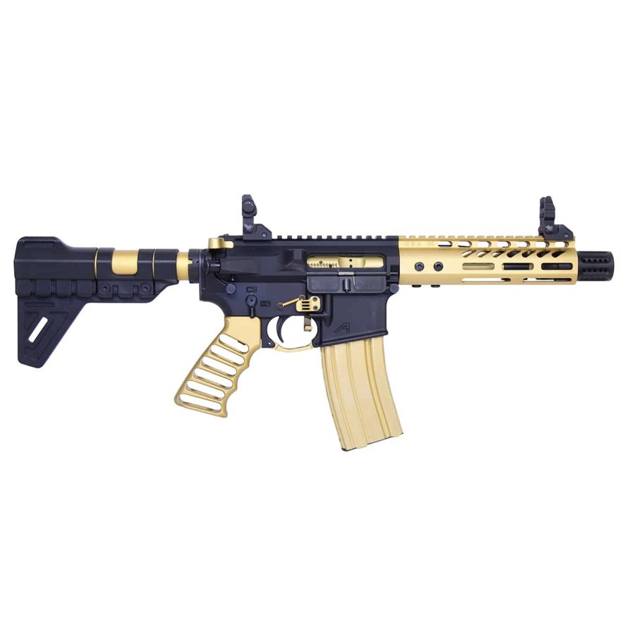 Custom black and gold AR-15 rifle with tactical features on a white background.