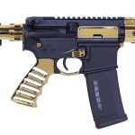 Custom two-tone AR-style firearm with gold accents, Picatinny rail, and black polymer magazine.
