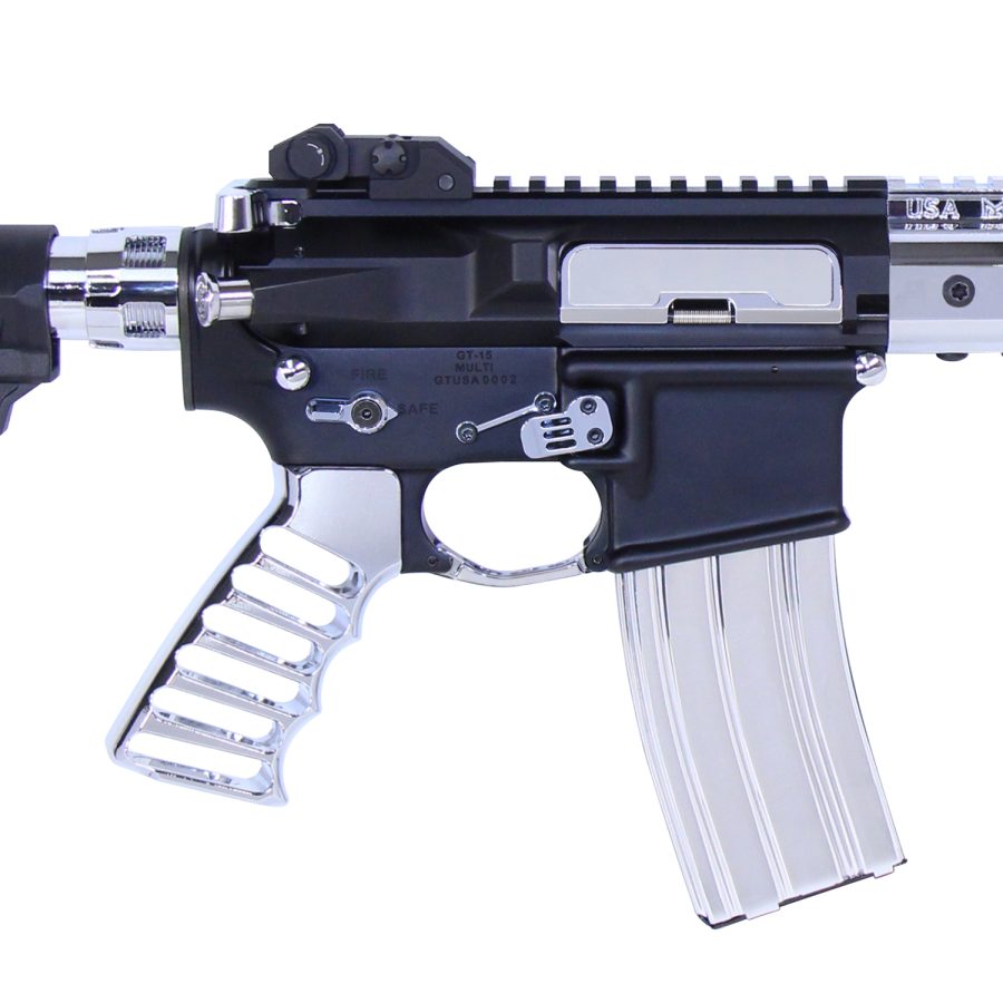 Close-up of QT-15 AR-15 rifle with black and silver finish, showing mechanical components.