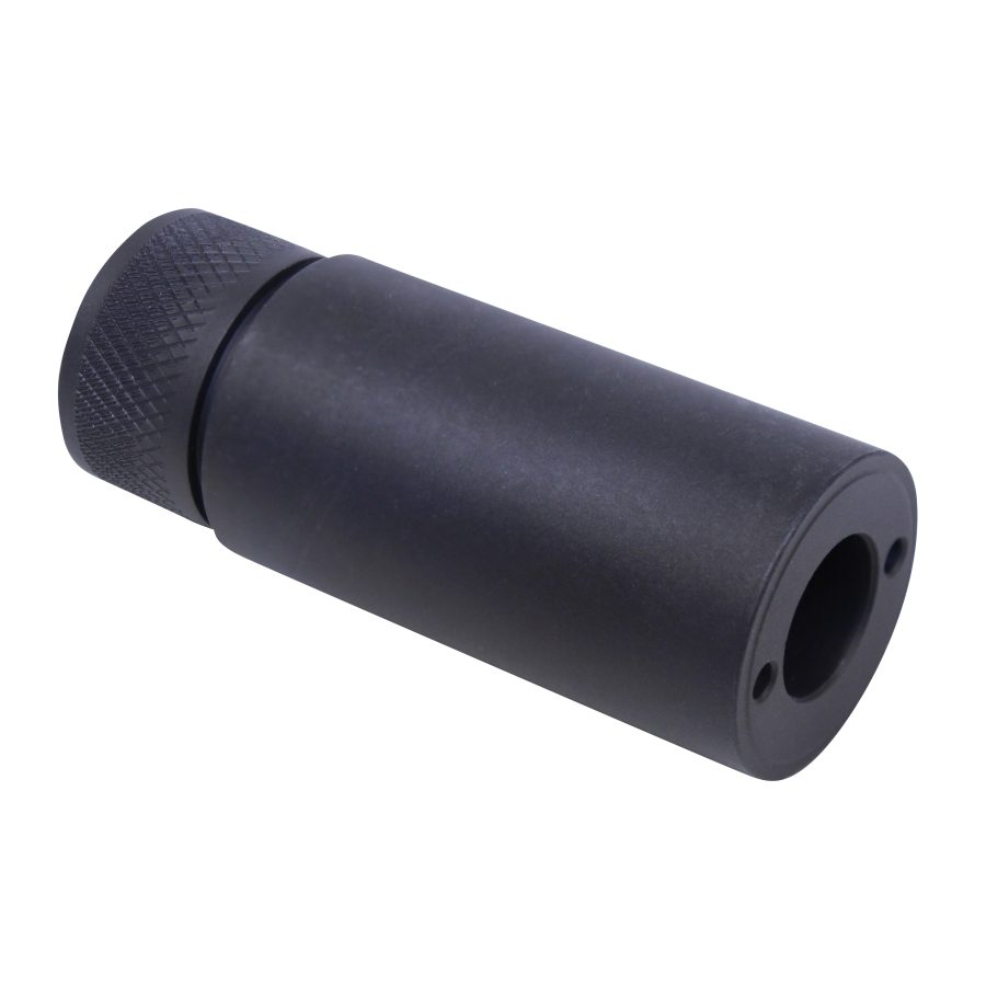 Black muzzle device with knurling, ports for gas redirection, industrial design, firearm accessory.