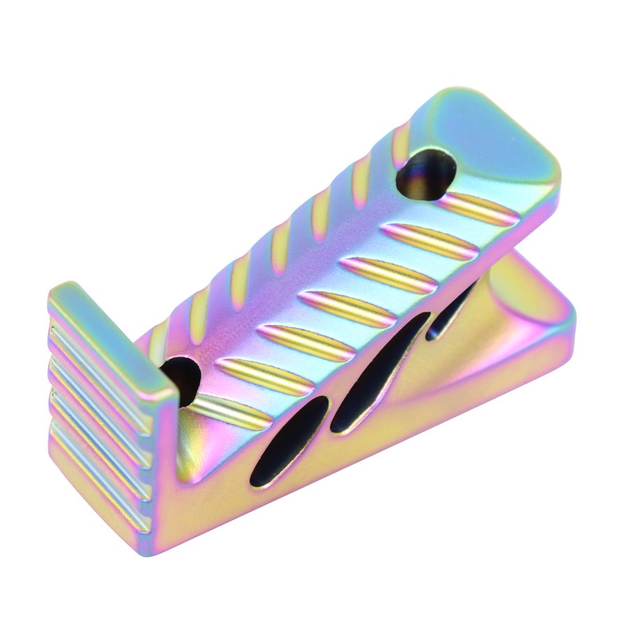Triangular metallic tool with holographic finish, stepped ridges, and black openings.
