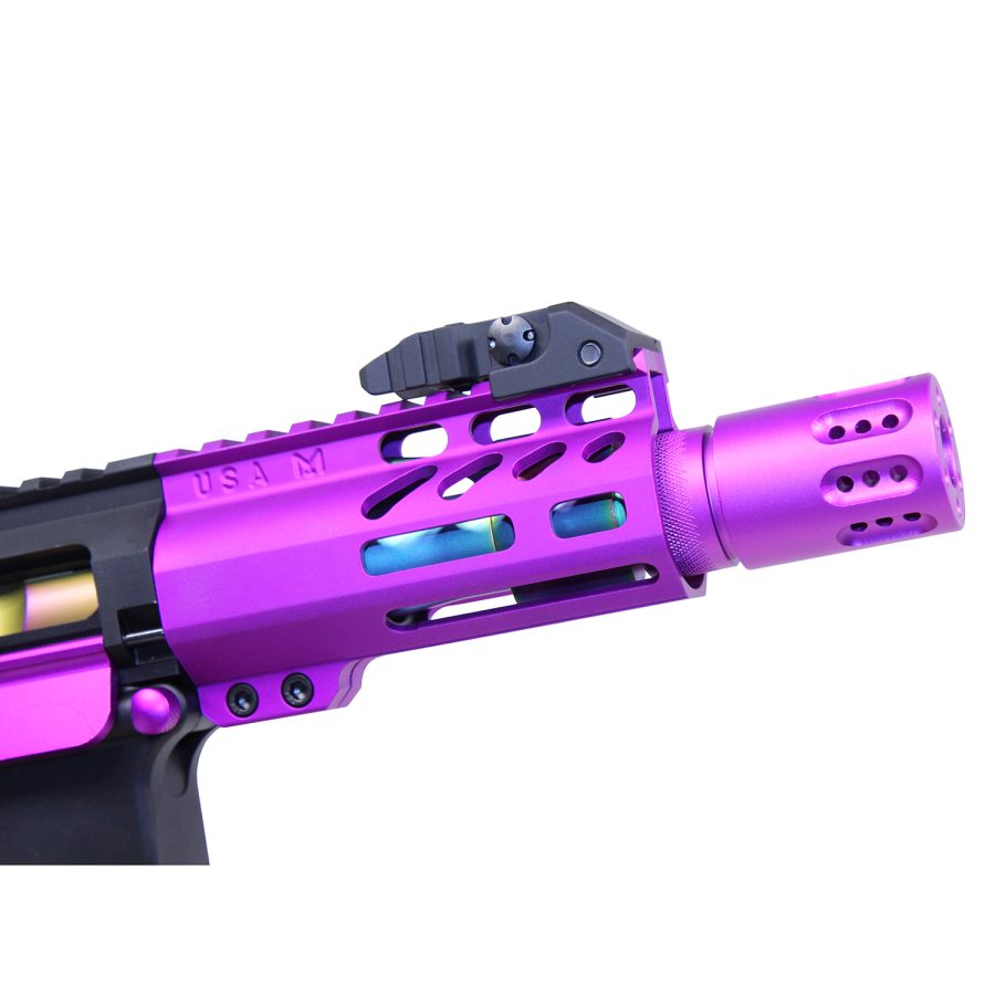 Purple firearm handguard with turquoise accents, M-LOK slots, and a vented muzzle device.