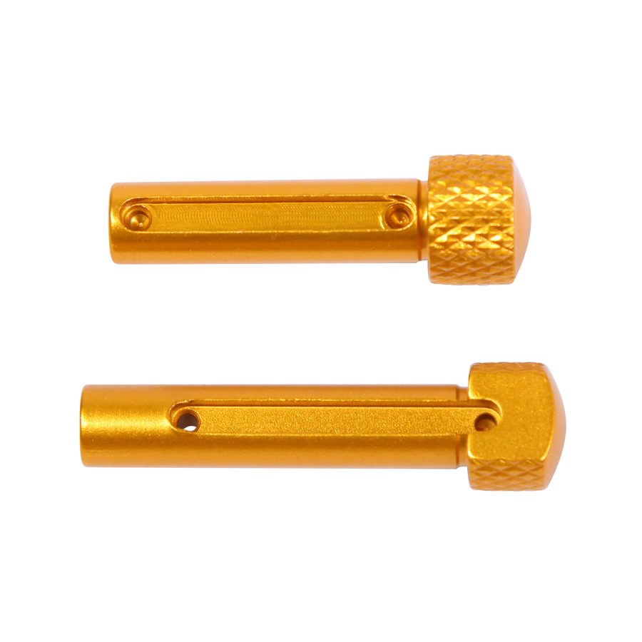 Precision golden metal components with knurled grips for mechanical assemblies, like RC vehicles.