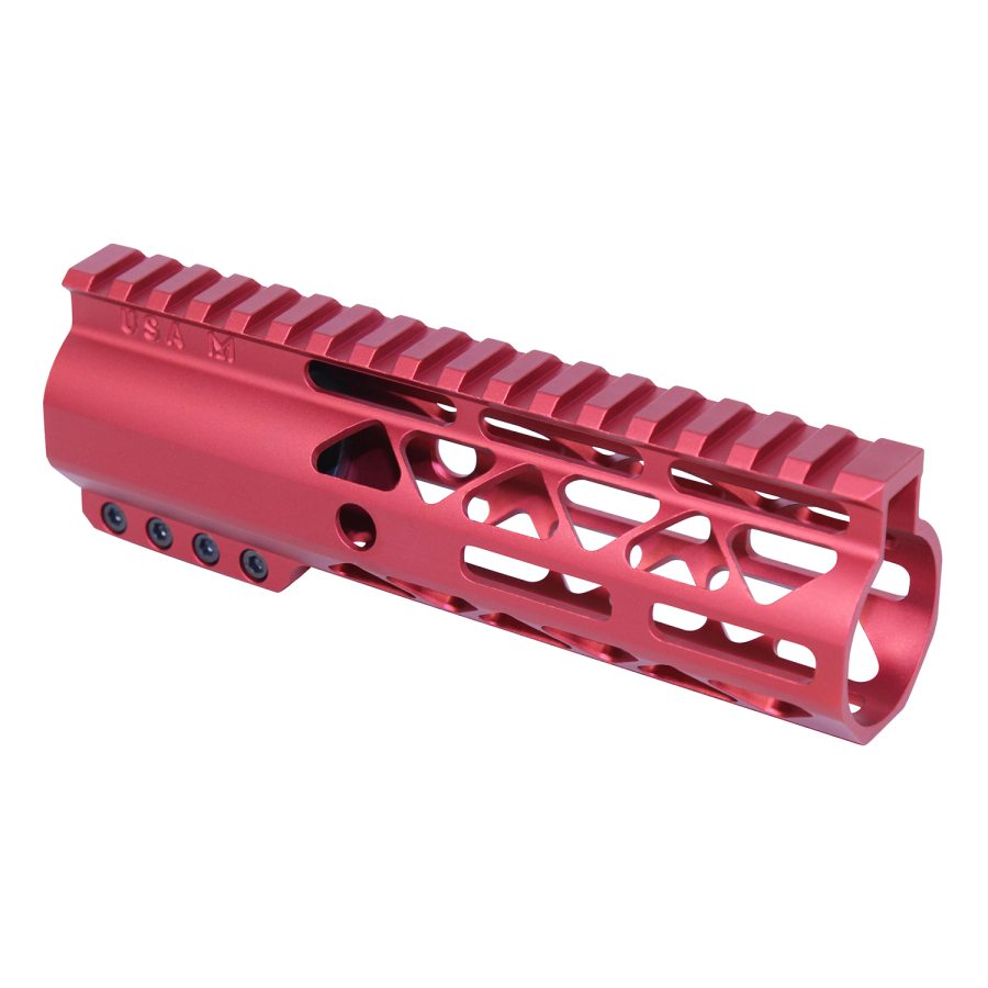 Candy apple red firearm handguard with Picatinny rail, geometric cutouts, and M-LOK points.