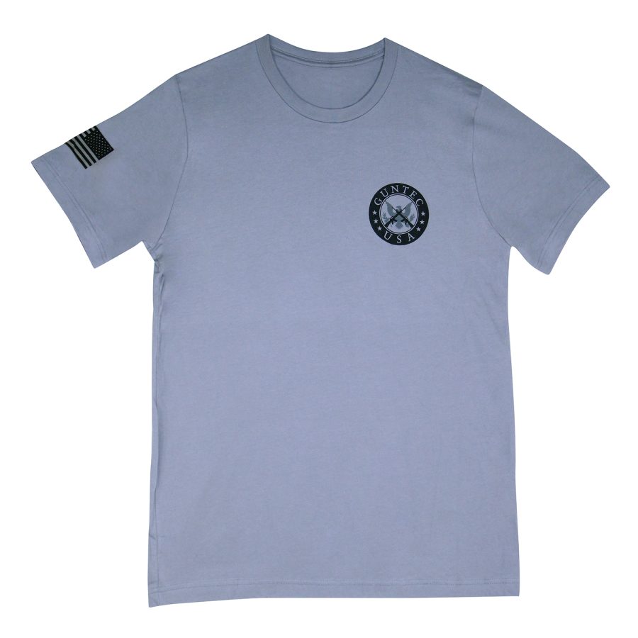 Light blue t-shirt with crew neck, emblem on chest, and patch on sleeve. Casual and versatile.