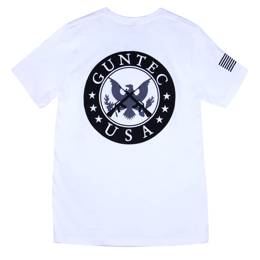 White Guntec USA t-shirt with eagle and rifles emblem, patriotic theme, American flag sleeve detail.