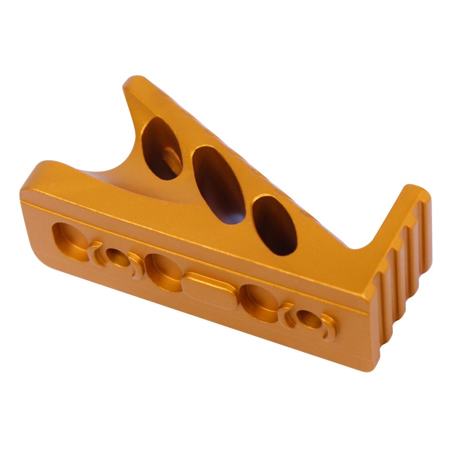 Gold anodized aluminum part with geometric design for high-performance applications.