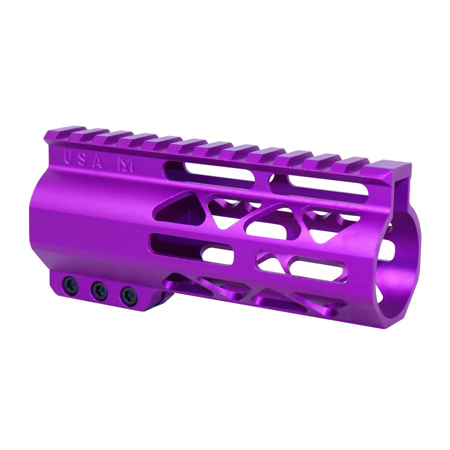 Purple anodized firearm handguard with Picatinny rail, geometric cutouts, and USA M engraving.