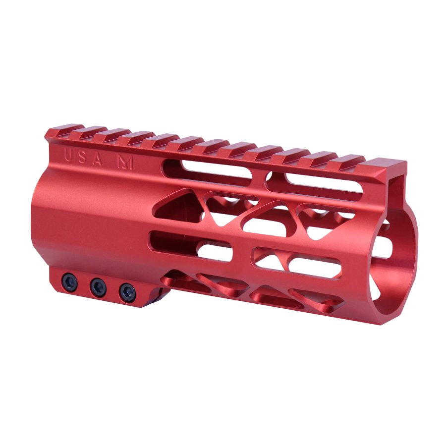 Red anodized firearm handguard with Picatinny rail, showcasing modern design and functionality.