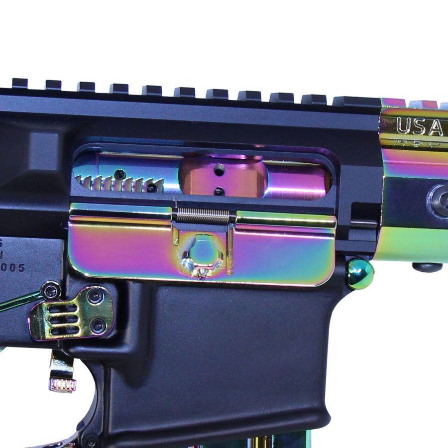 AR-15 rifle with rainbow titanium nitride bolt carrier, showcasing vibrant engineering and aesthetics.