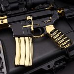 Luxury black-and-gold AR rifle, premium craftsmanship, gold-plated parts, tactical setup display.