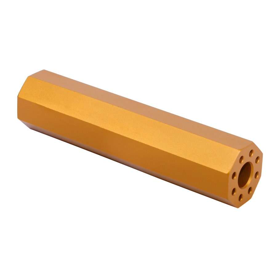 Golden hexagonal metallic component, precision-machined for engineering, featuring circular holes.
