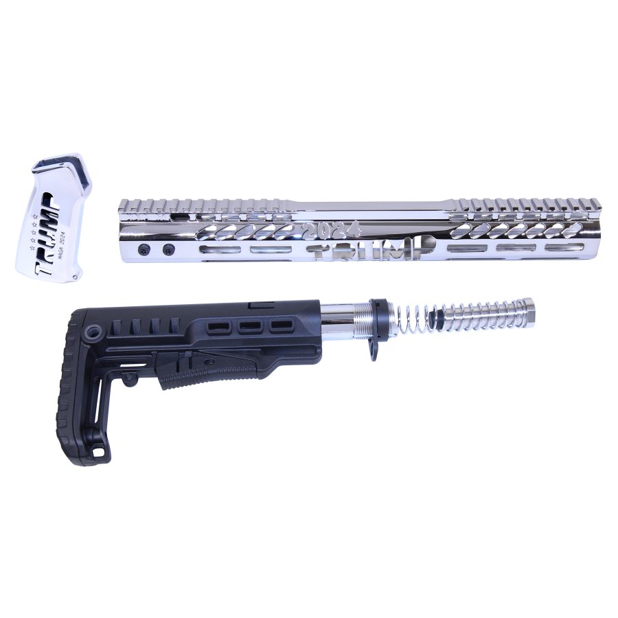 Disassembled firearm parts engraved with Trump 2024, featuring chrome and black finishes.